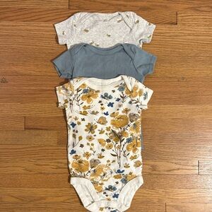 Little planet 3-6 baby onesies